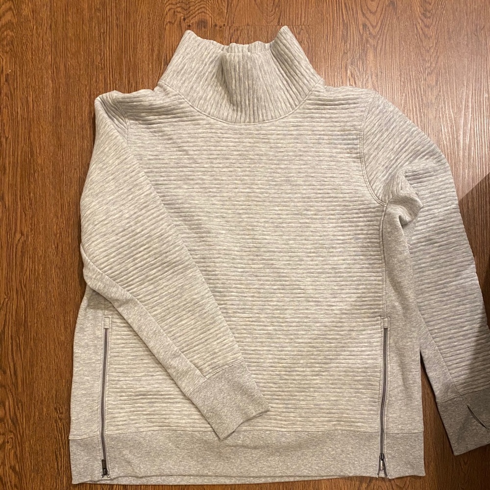 Grey athletic pullover with side zippers